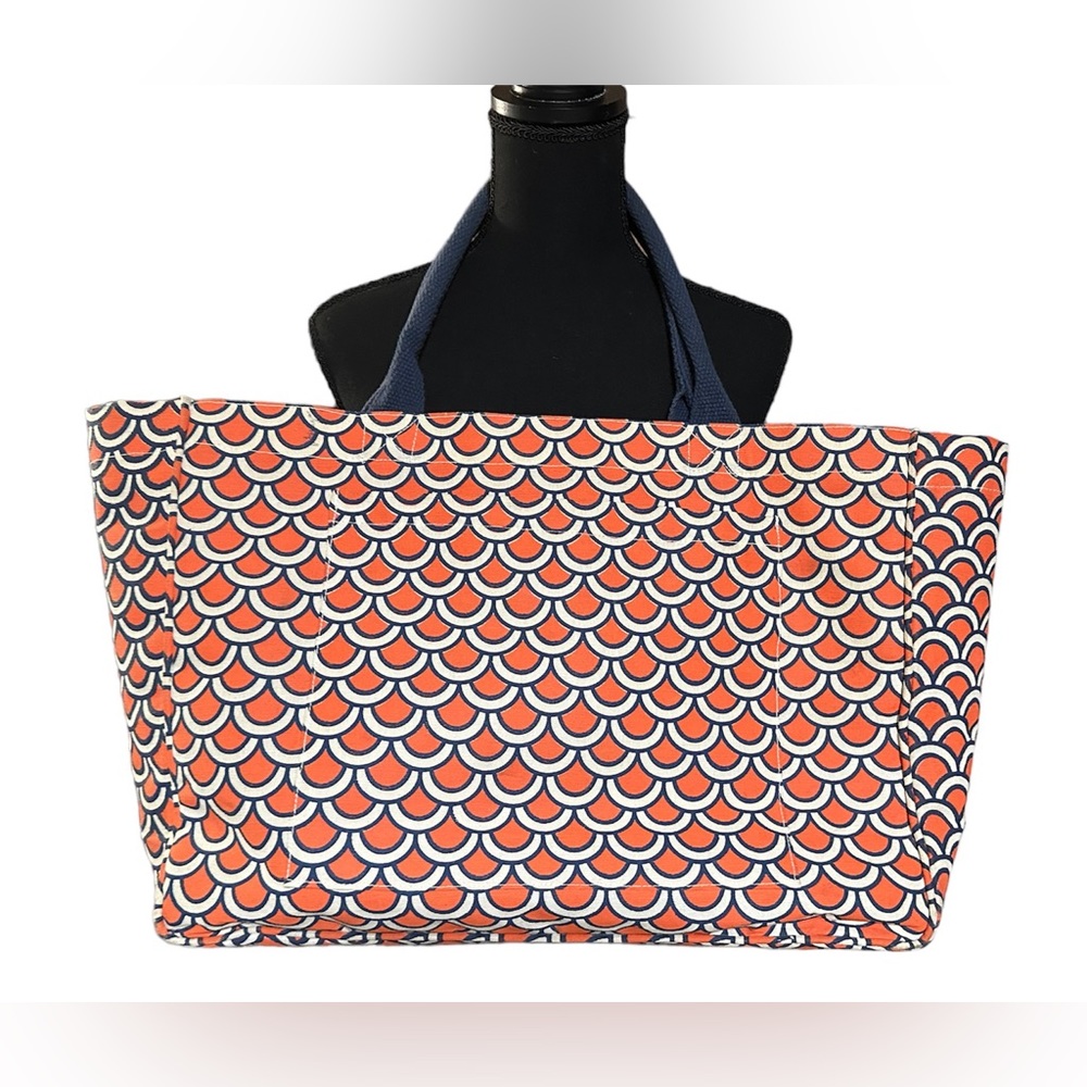 Mud Pie large tote seams measure 19x7" but it extends out a bit more.